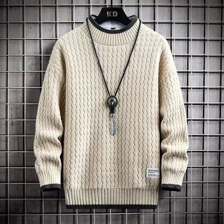 Levi | Sweater med farveblokke og fletmønster