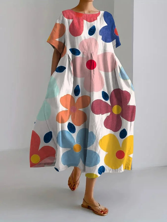 Eliana | Midi Kjole med Blomster i Løs Stil og Sommerkomfort til Farverige Dage