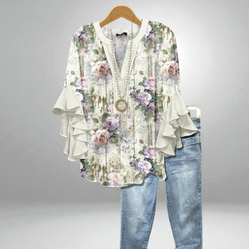 Fleur – Romantisk bluse med blomsterprint og brede ærmer